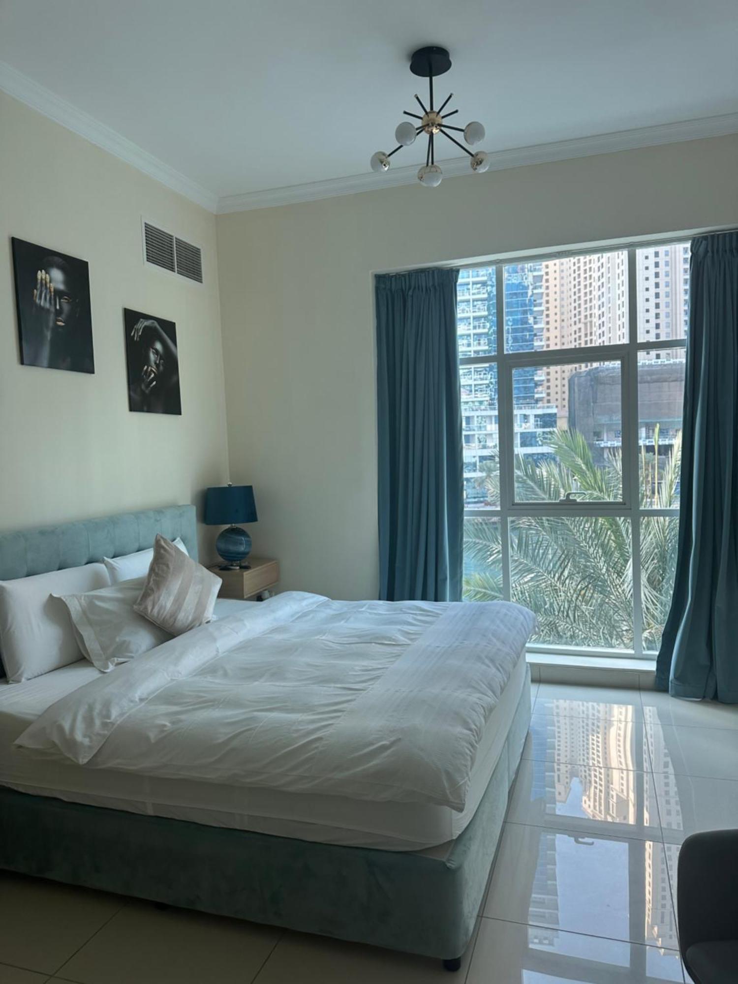 Magique Holiday Homes Marina Viuw دبي المظهر الخارجي الصورة